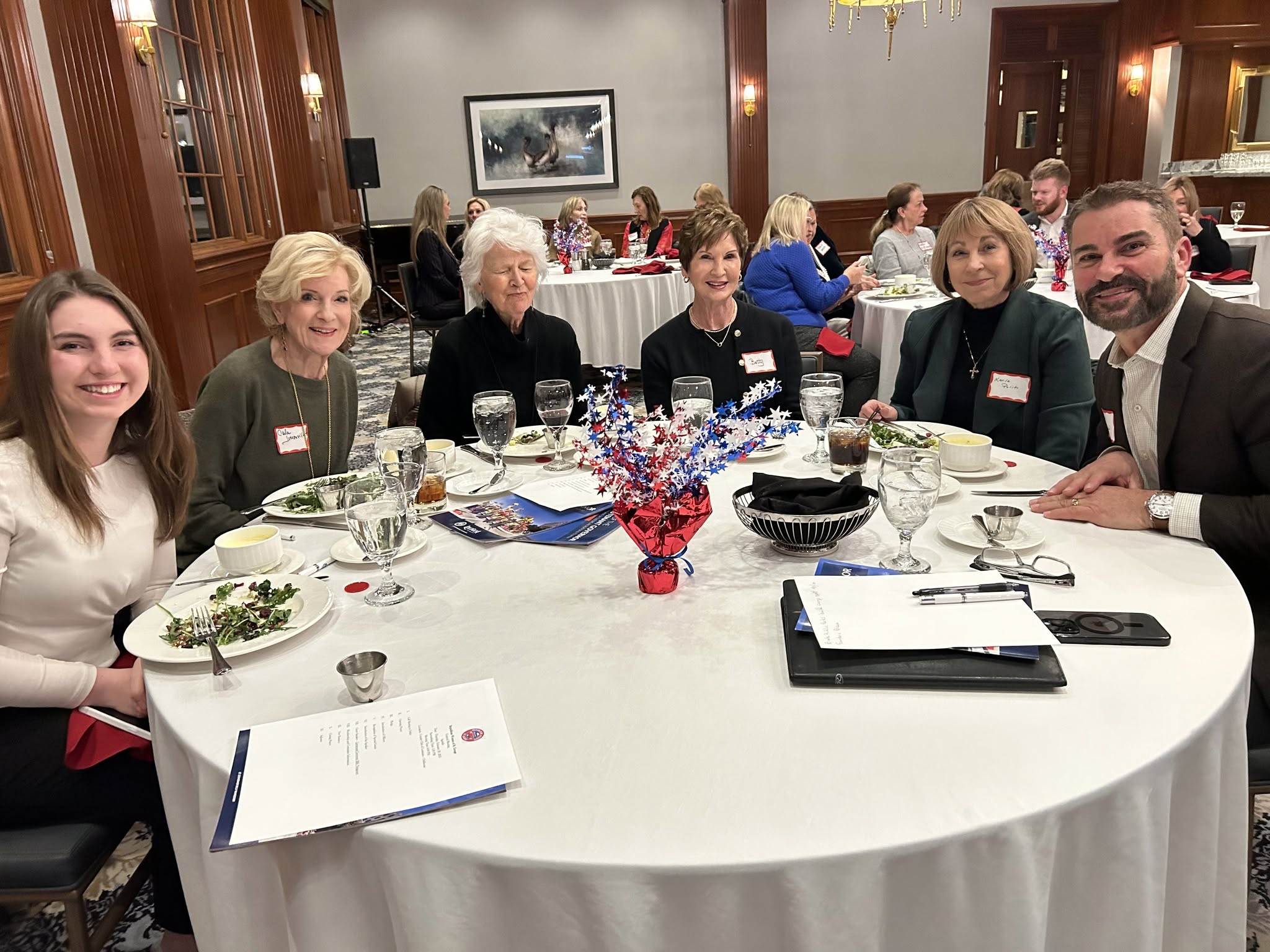 Group of Women Sitting at Table at Monthly RWSG Meeting